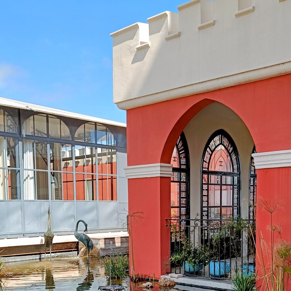 A snapshot of part of the Chateau de Cremat's distinctive orange building