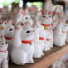 Thousands of beckoning maneki neko at Gotokuji Temple