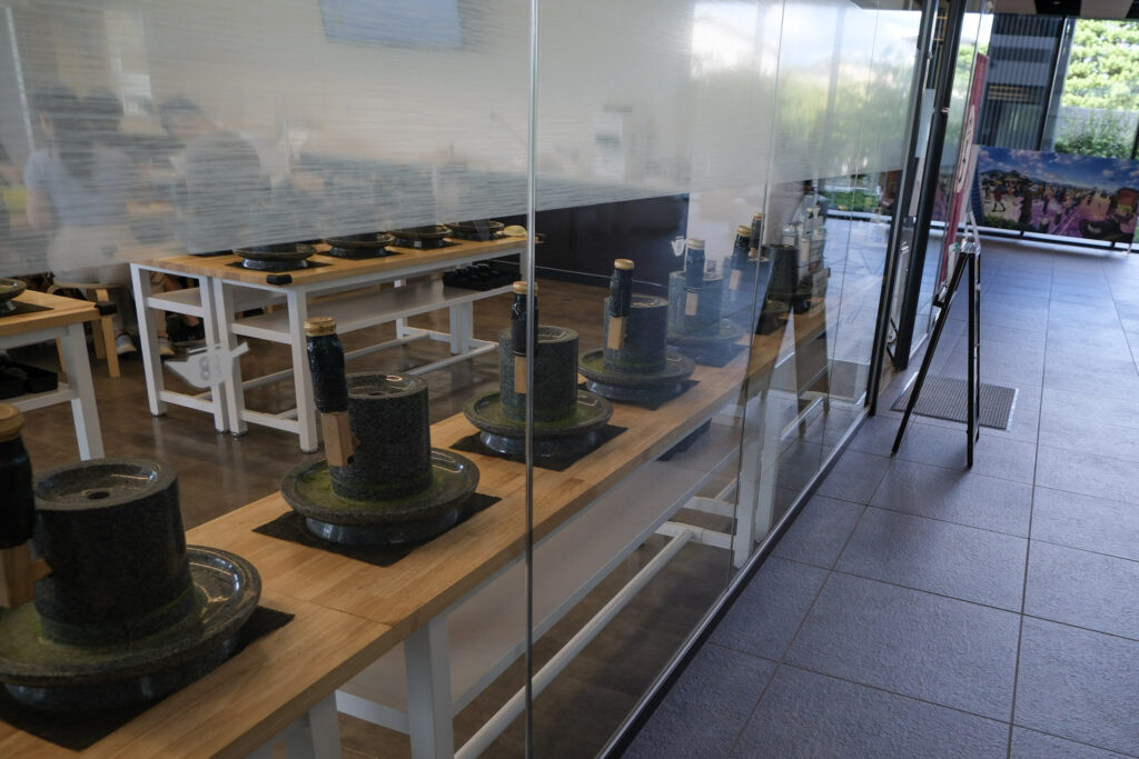 Matcha grinding workshop in the tea museum in Uji