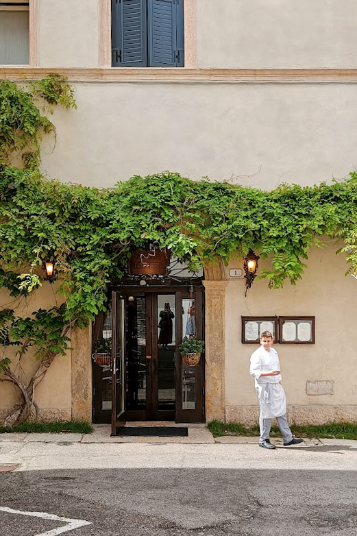 Verona Restaurant with a chef outside