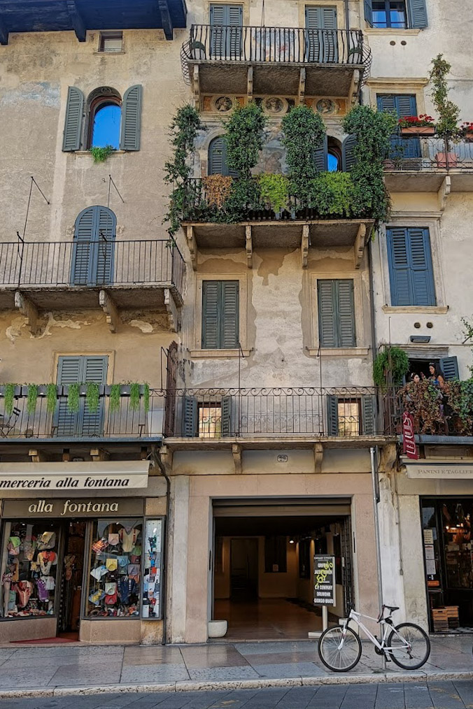 Stucco facade of old buildings in Verona, Italy