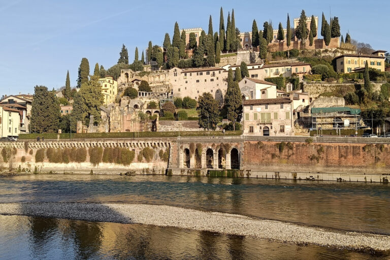 View of the Adige river in Verona, near the focaccia shop that's a great option to eat vegan in Verona