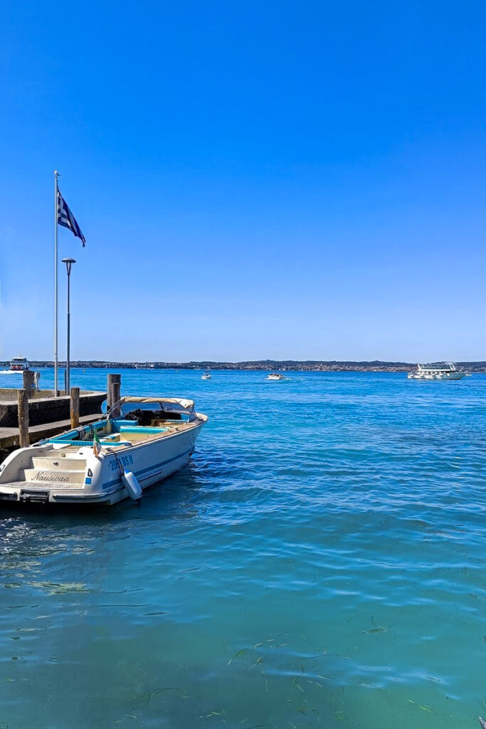 A view of a boat on the water of Lake Garda, Italy