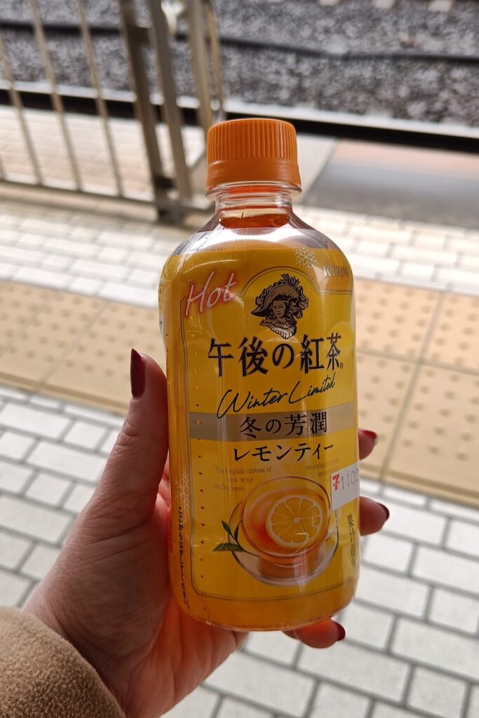 Bottle of lemon tea on the train platform in Japan
