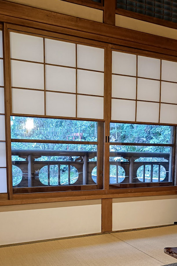 Traditional Japanese window with nature view