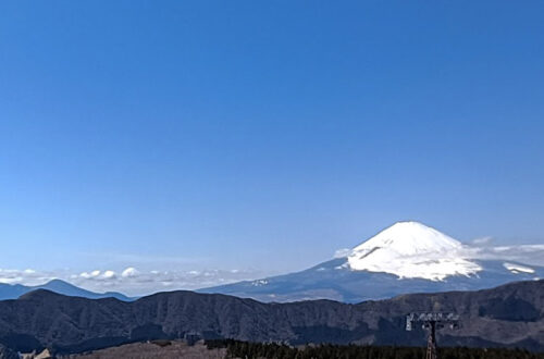 Snow-capped Mount Fuji under clear blue sky, on a one day in Hakone trip