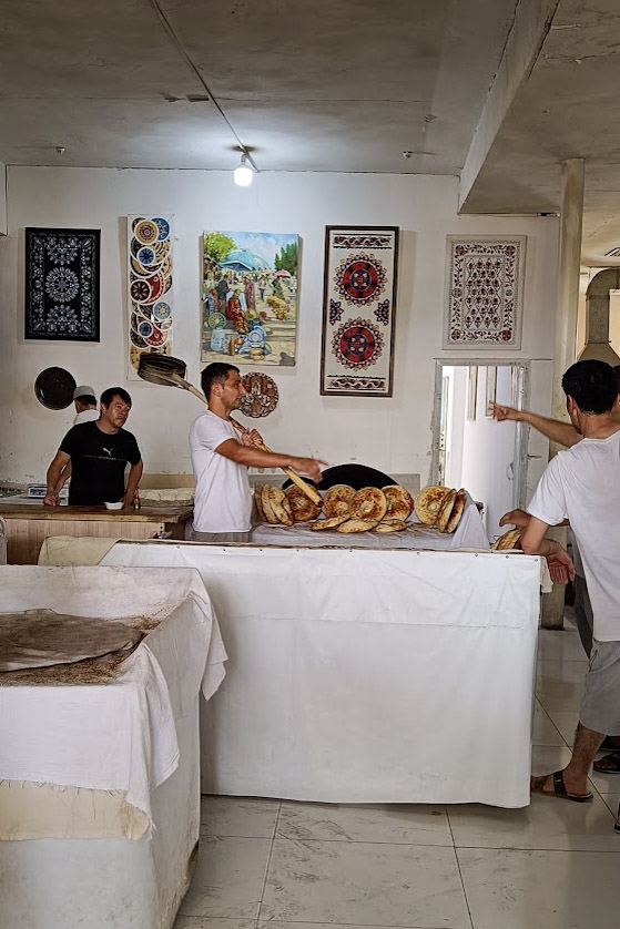 Bakers at work in Chorsu Bazaar, Uzbekistan