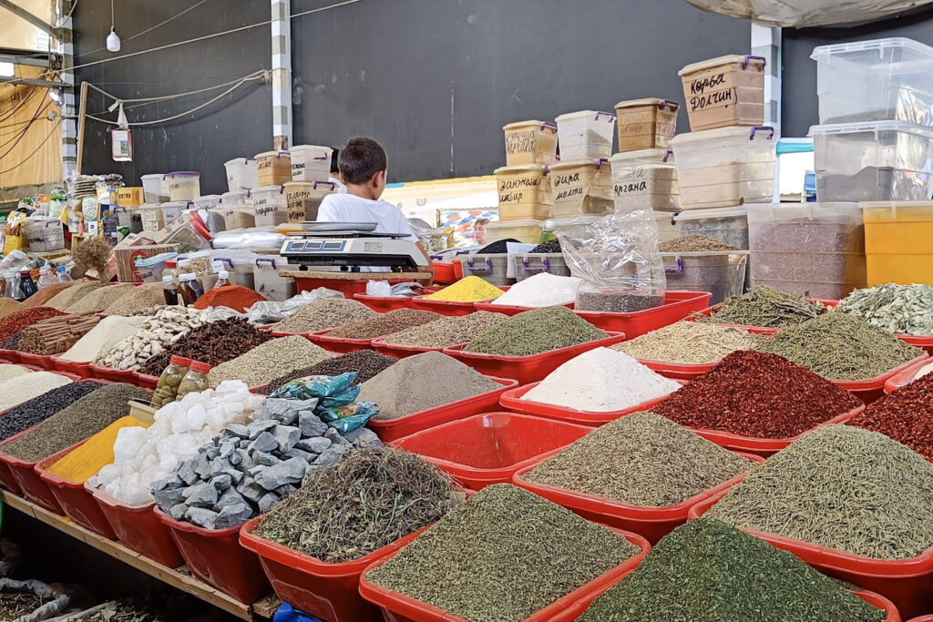 A market stall in chorsu bazaar in Tashkent, Uzbekistan - a good stop for travelling Uzbekistan as a vegan