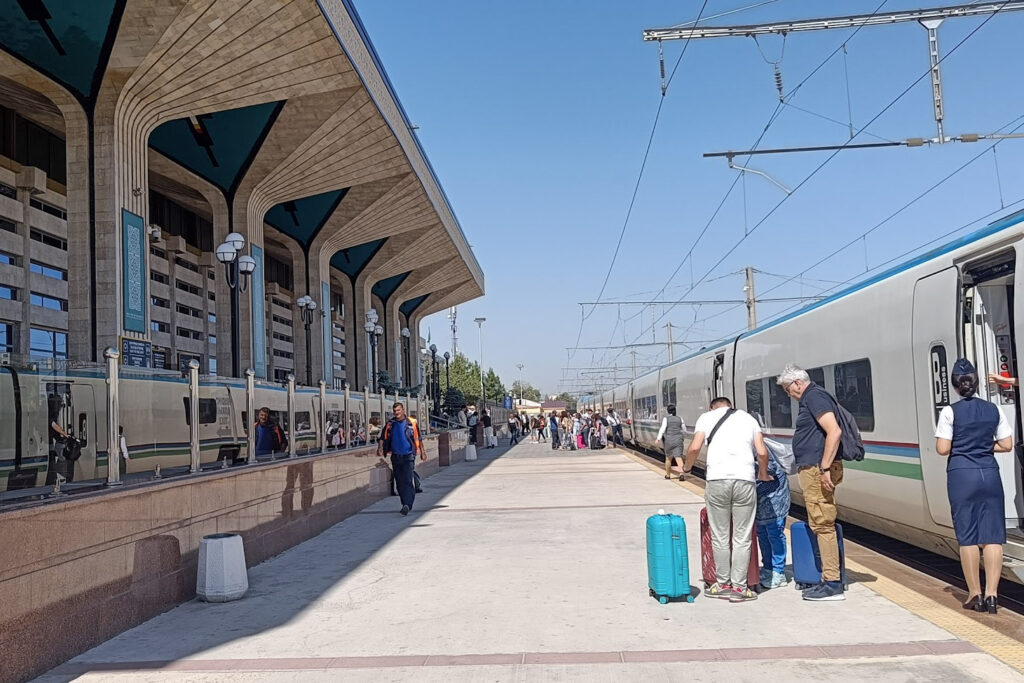 The platform at Samarkand station in Uzbekistan with the Afrosiyob parked alongside
