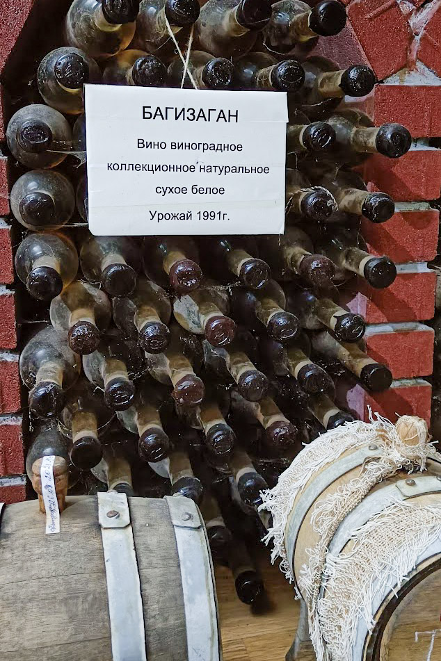 A rack of dusty wine bottles in Bagizagan winery, in Samarkand, Uzbekistan