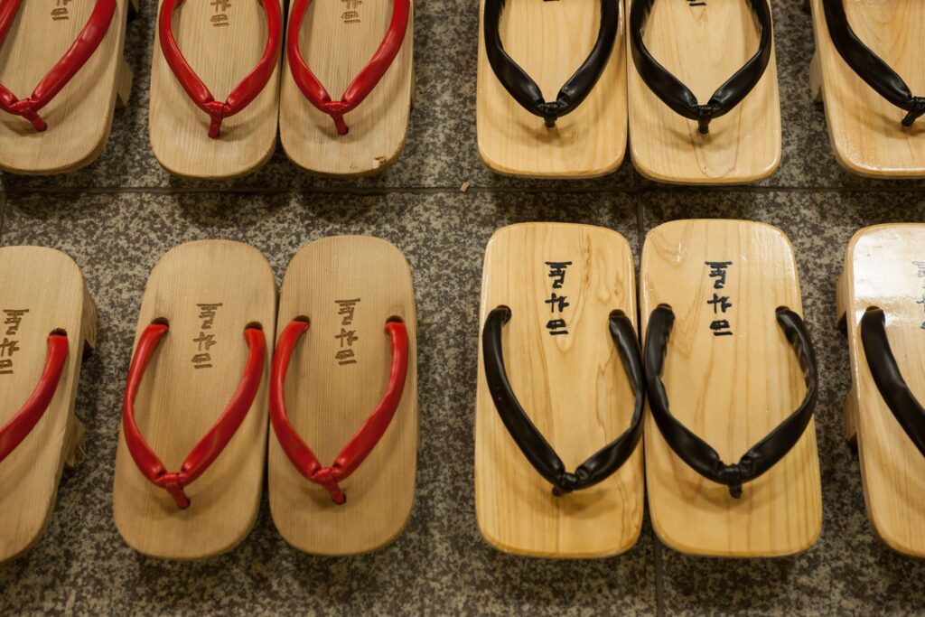 A row of geta sandals in a kinosaki ryokan
