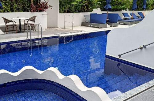 Modern pool with blue tiles in Away Chiang Mai hotel