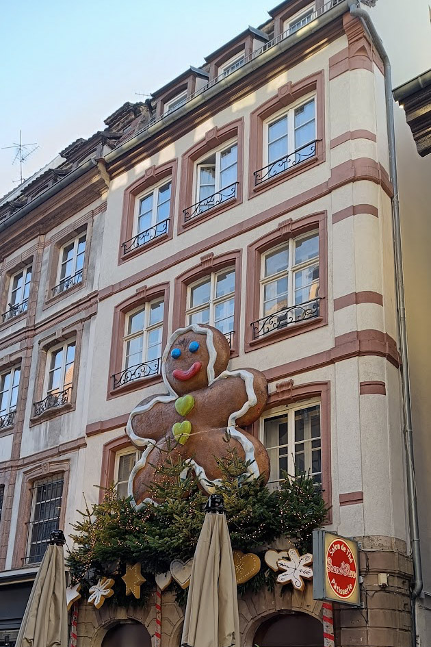 Building decorated with a gingerbread man in Strasbourg at Christmas