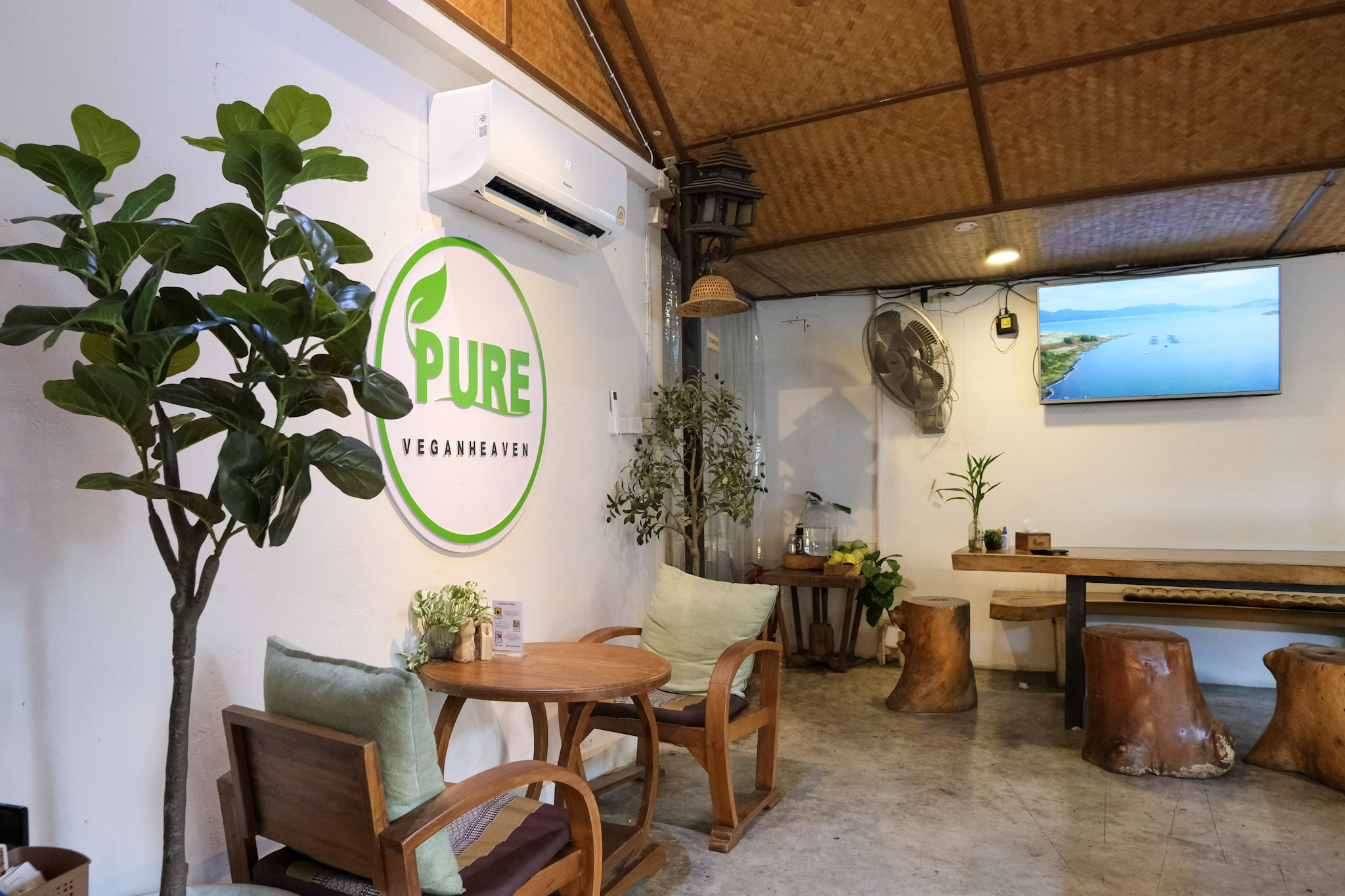 Cozy vegan cafe interior with plants
