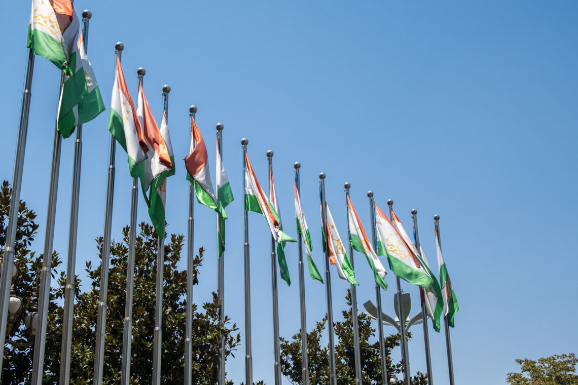 First time in Tajikistan header image of flags